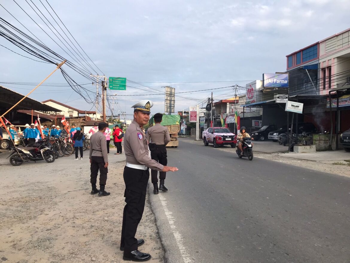 Personil OMP Polres Singkawang Lakukan Pengamanan Kampanye Paslon 02